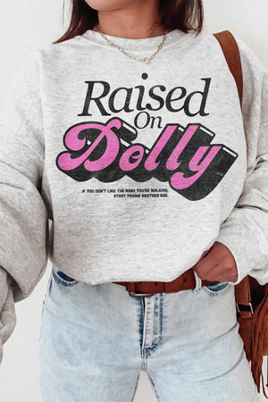 RAISED ON DOLLY GRAPHIC SWEATSHIRT