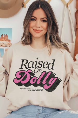 RAISED ON DOLLY GRAPHIC SWEATSHIRT