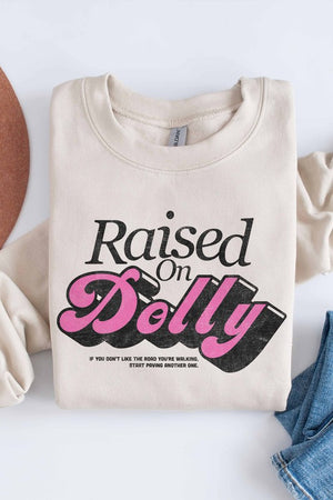 RAISED ON DOLLY GRAPHIC SWEATSHIRT