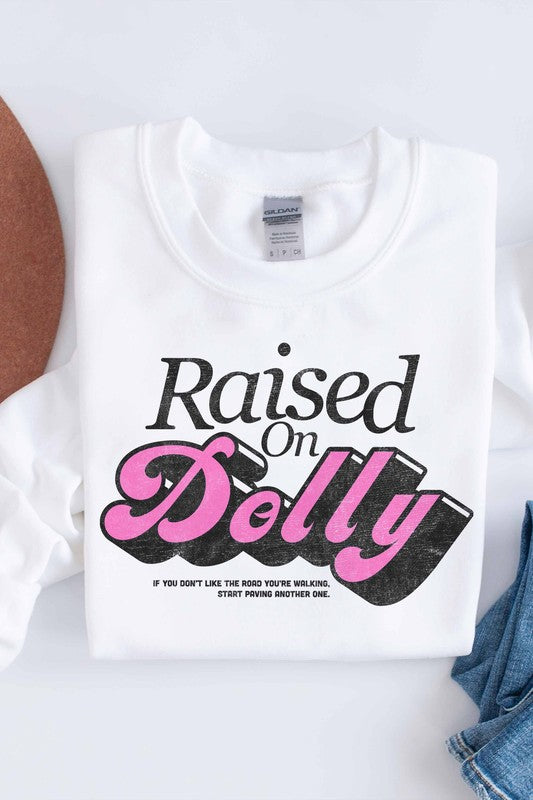 RAISED ON DOLLY GRAPHIC SWEATSHIRT